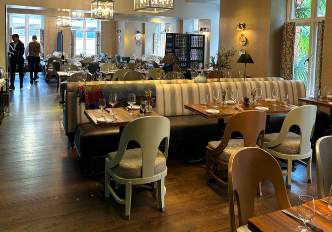 The Caxton Grill at St. Ermin's Hotel sources many of its ingredients from a rooftop kitchen garden and a unique bee terrace where the insects are busy making honey.