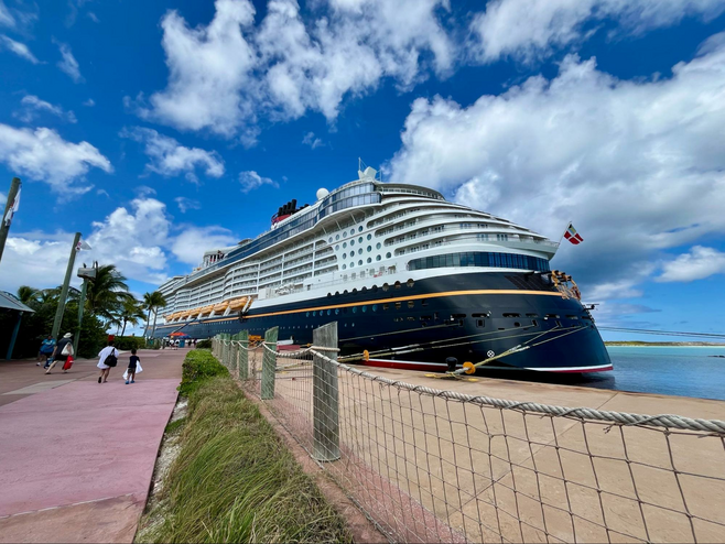 The cruise ship Disney Wish is pictured docked at Disney's private island destination Castaway Cay in the Bahamas.