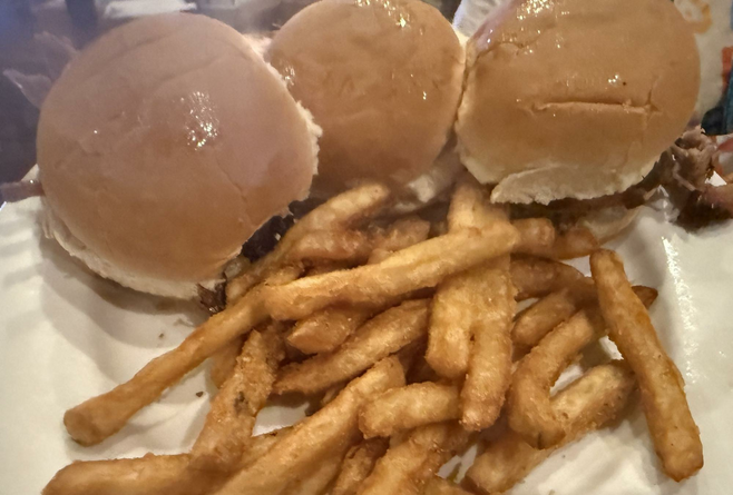 Plate with 3 sliders and french fries.