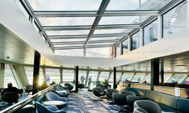 Large windows and glass ceilings in Pollux cruise ship.