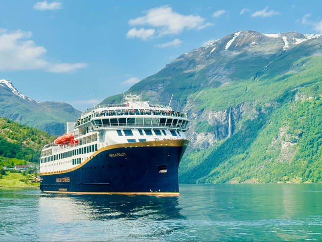 Pollux cruise ship in a fjord.