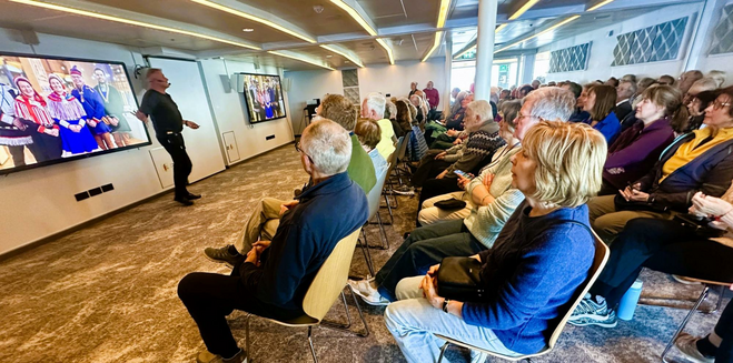 Expedition team member shares cultural information.