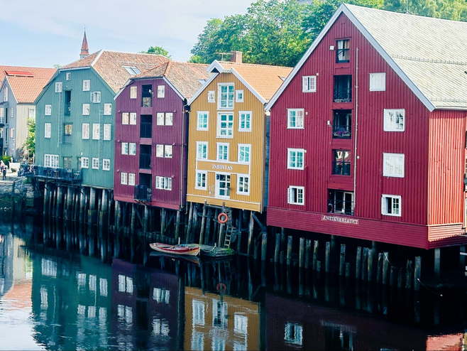 Colorful timber buildings on waterfront in Trondheim.