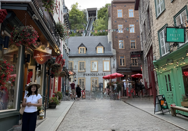 View of Rue du Petit-Champlain with funicular tracks rising to Upper Town in Quebec's historic heart.