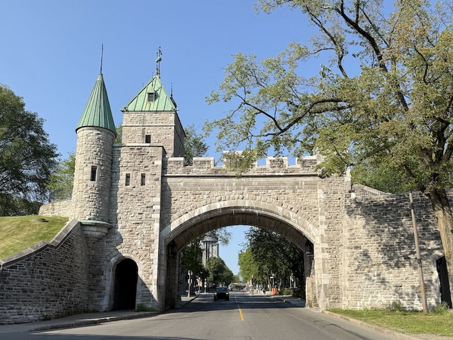 Historic Saint-Louis Gate in Old Quebec, a beautiful backdrop a romantic getaway Quebec City scene.