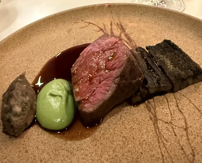 Beef with mint and eggplant, one of five courses at Michelin one-star ARVI Restaurant, a romantic atmosphere in Quebec City.