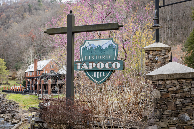 Entrance to Historic Tapoco Lodge in Robbinsville, North Carolina, with rustic mountain lodge design.