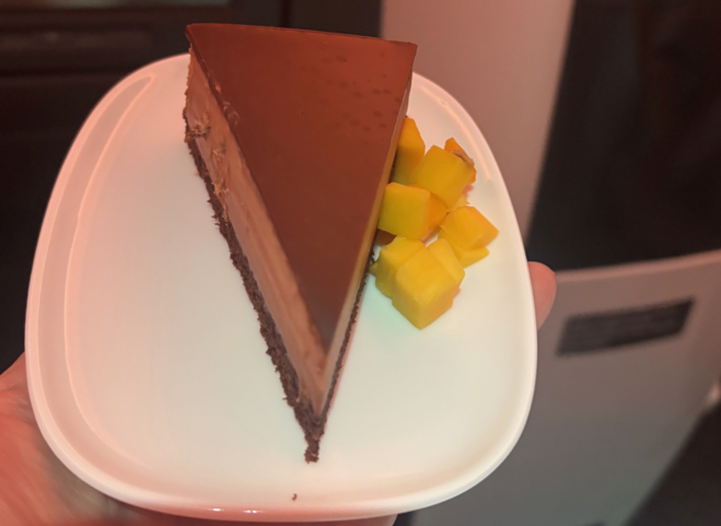 Rich chocolate torte with mango