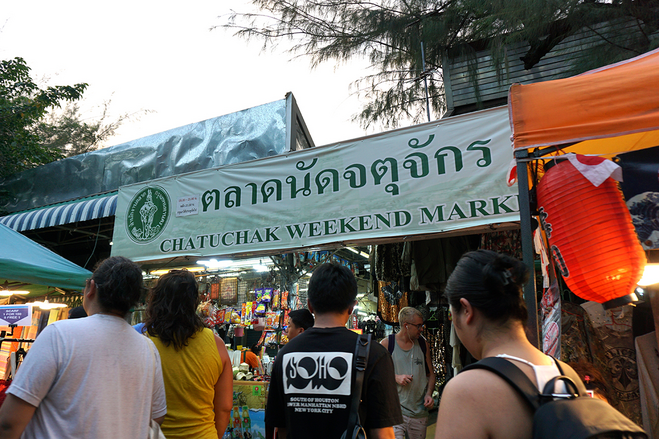 Market banner and shoppers