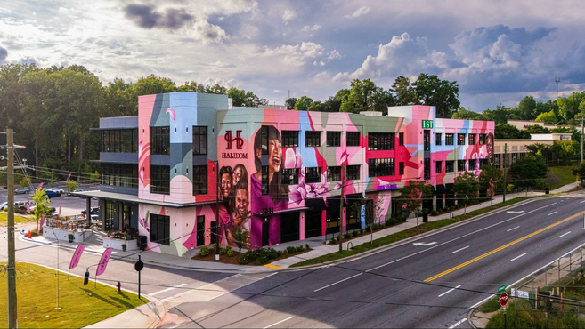 Colorful mural-covered building housing Atlanta food hall Halidom Eatery