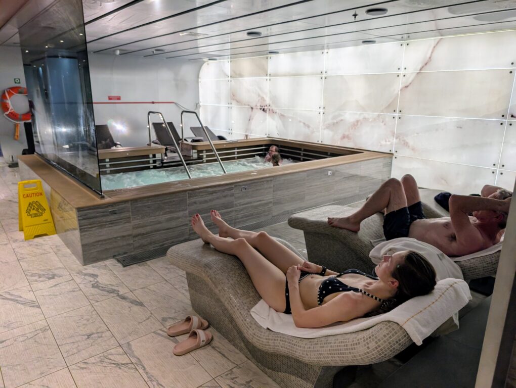 A woman and man relaxing in thermal spa aboard the MSC Seascape