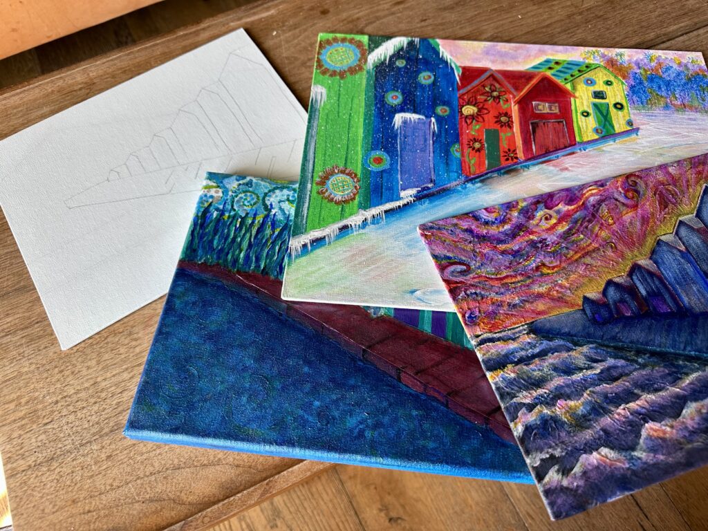 Samples of acrylic paintings of the boathouses in Canandaigua made during a class at the Lake House