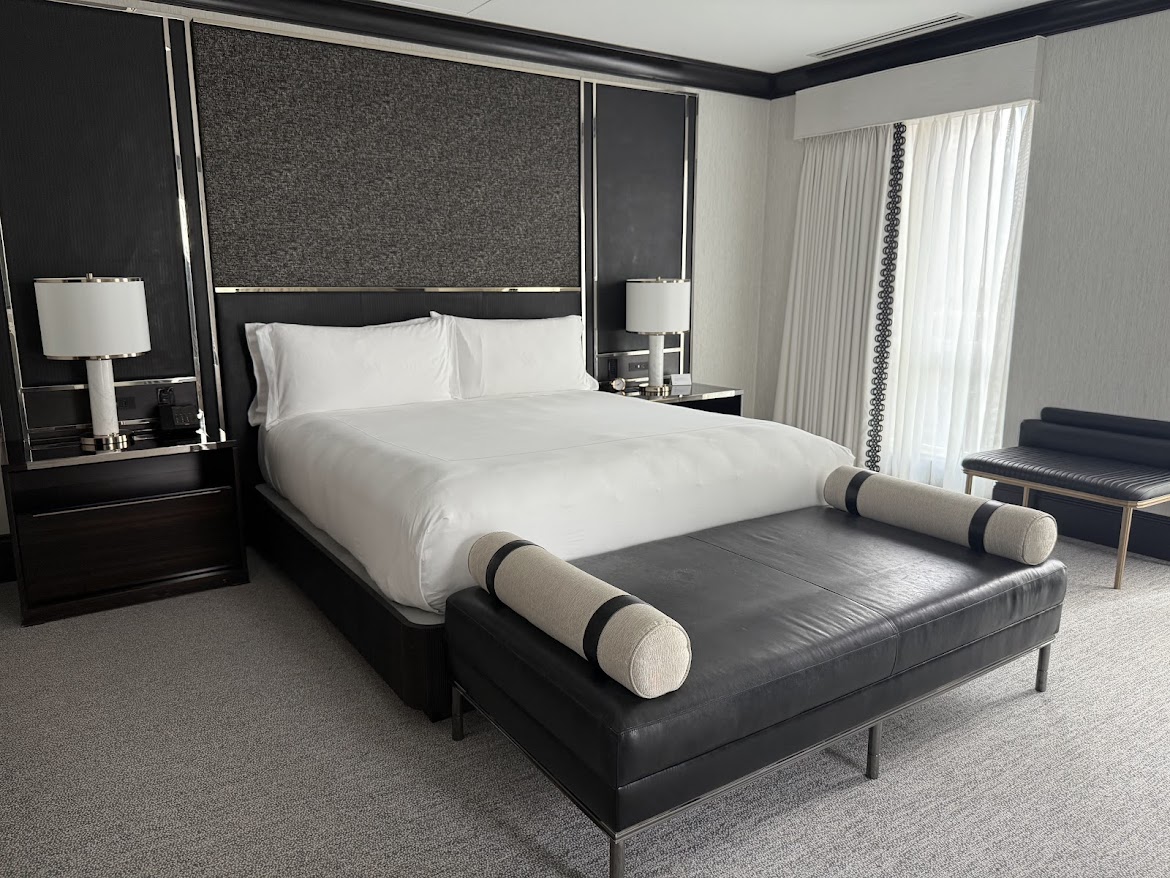 A guest room at The Waldorf Astoria Chicago is an indulgent treat with many uncommon amenities. The crisp black and white details are very chic.