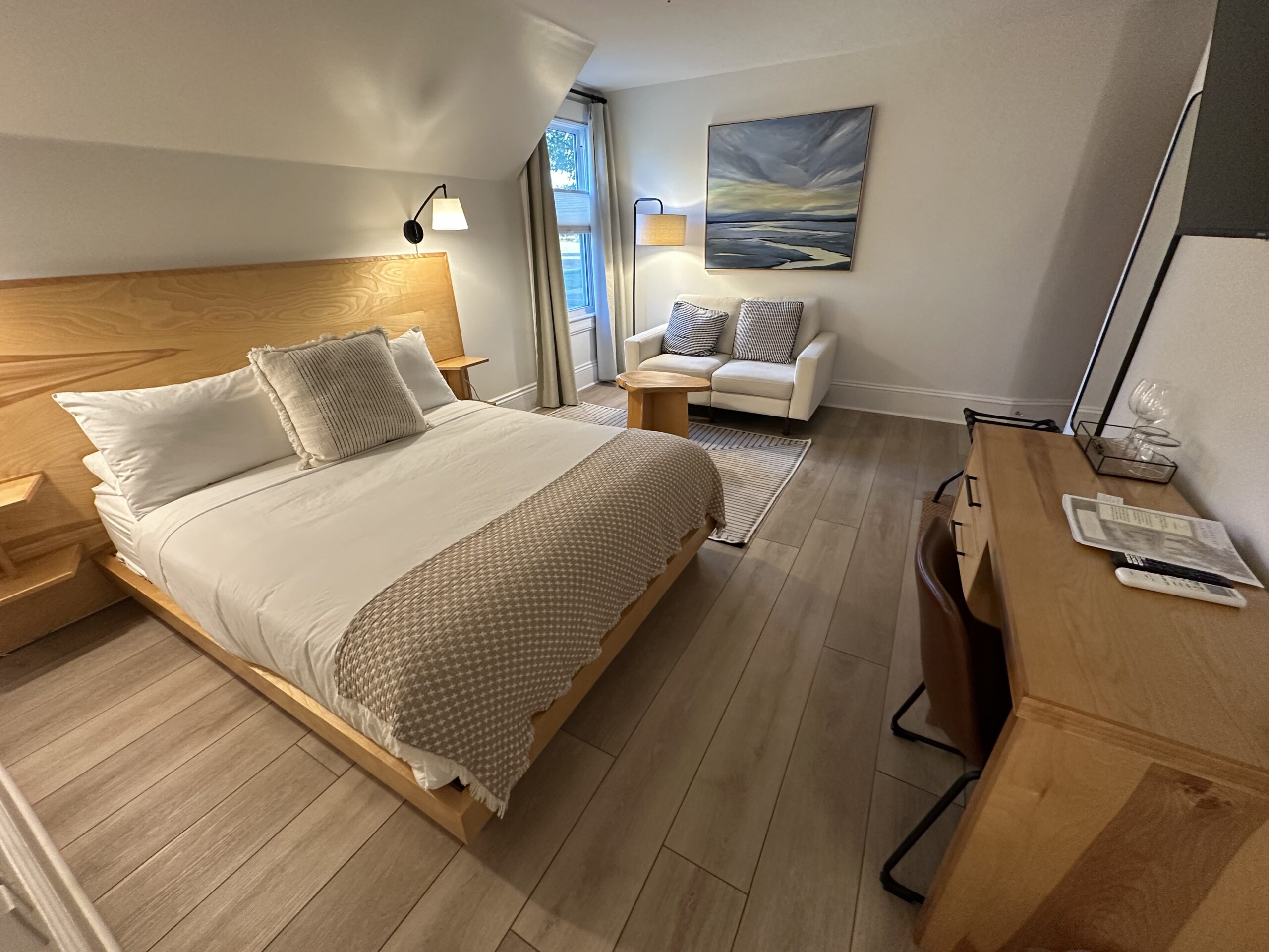 Neutral and modern bedroom at the Planters Ridge vineyard farmhouse stay in Nova Scotia's Annapolis Valley.