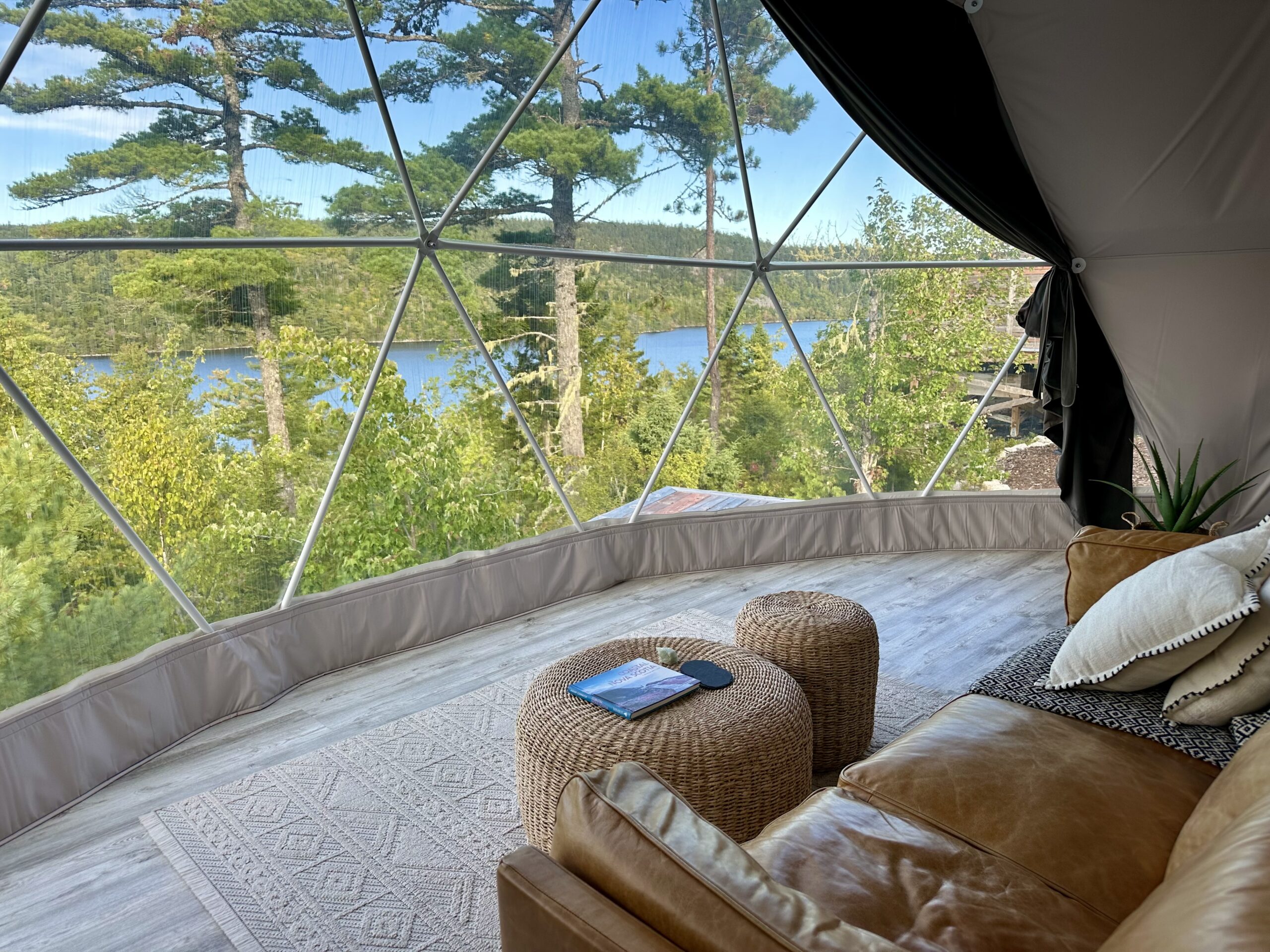View of Porters Lake in Nova Scotia viewed from inside a dome at Nalu Retreat, a recommended Chowder Trail hotel.
