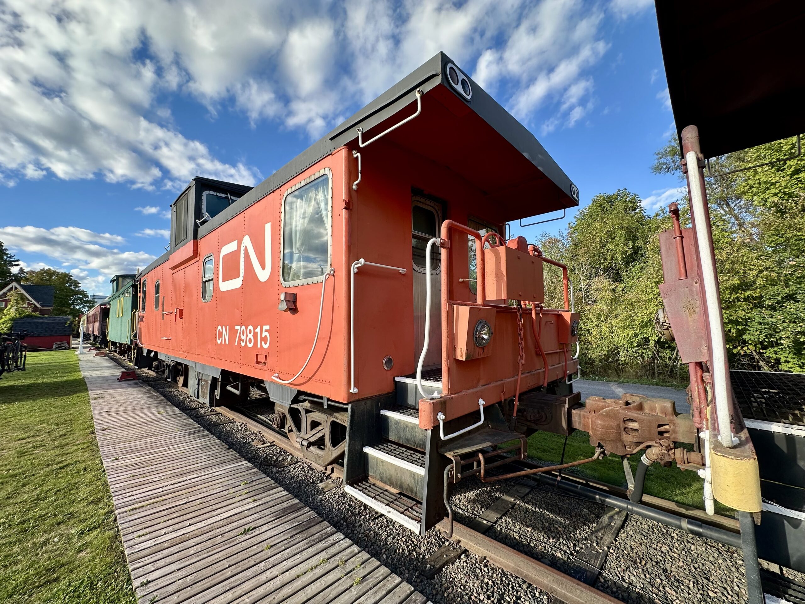 Vintage caboose at the Train Station Inn features a queen bedroom, bath with shower and sitting area.