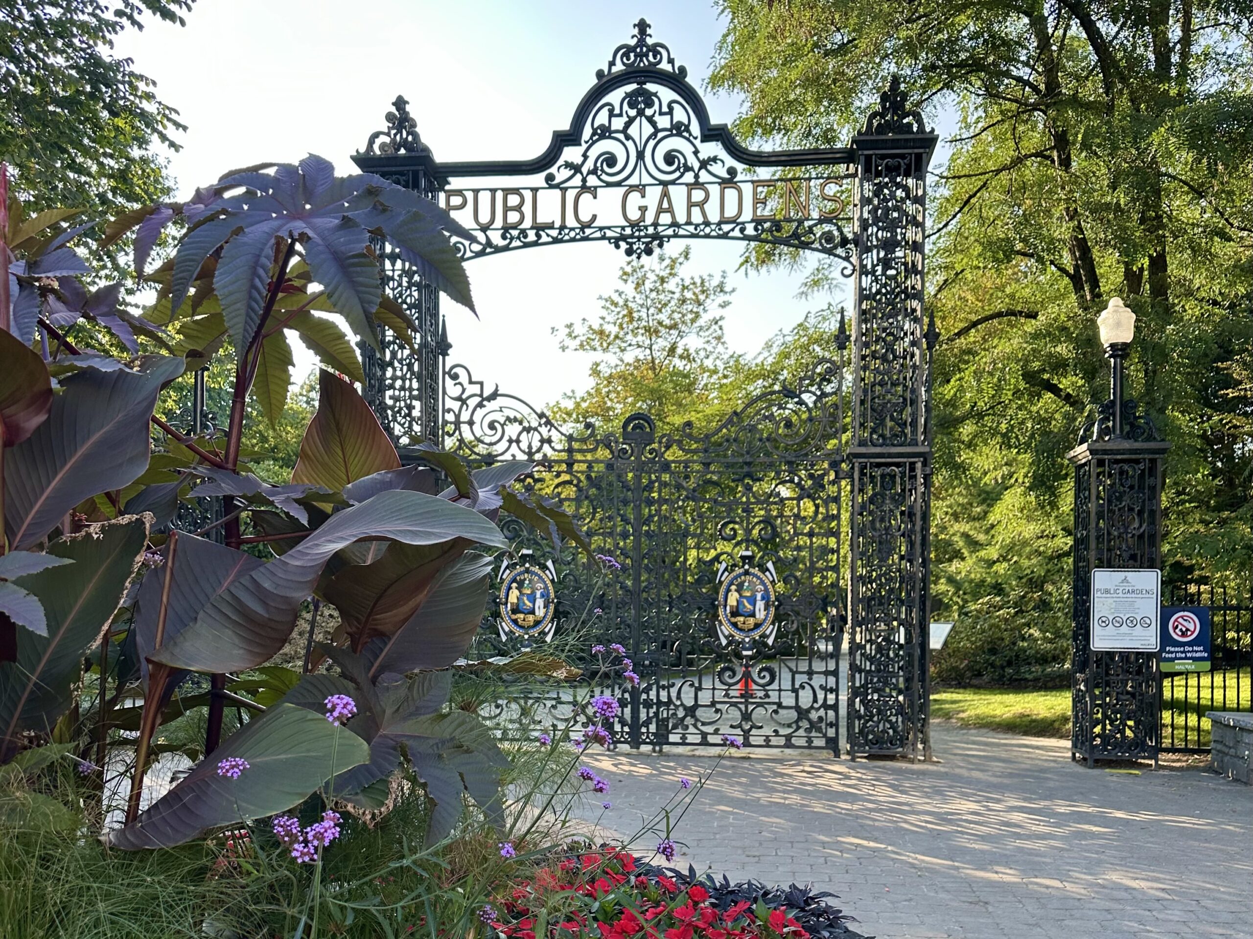 Ornate iron gates mark the entrance to the Halifax Public Gardens, a must-stop on a Nova Scotia Chowder Trail road trip.