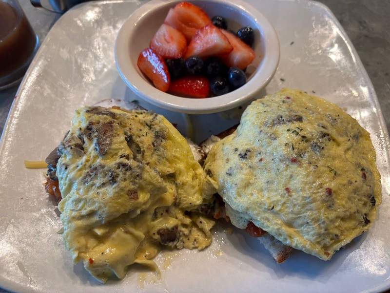 Eggs on toast and berries for breakfast