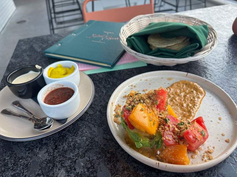 Tex mex stuffed avocado with tomatoes and tortillas