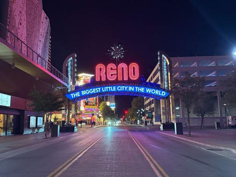 Neon sign suspended over a street in Reno, Nevada.