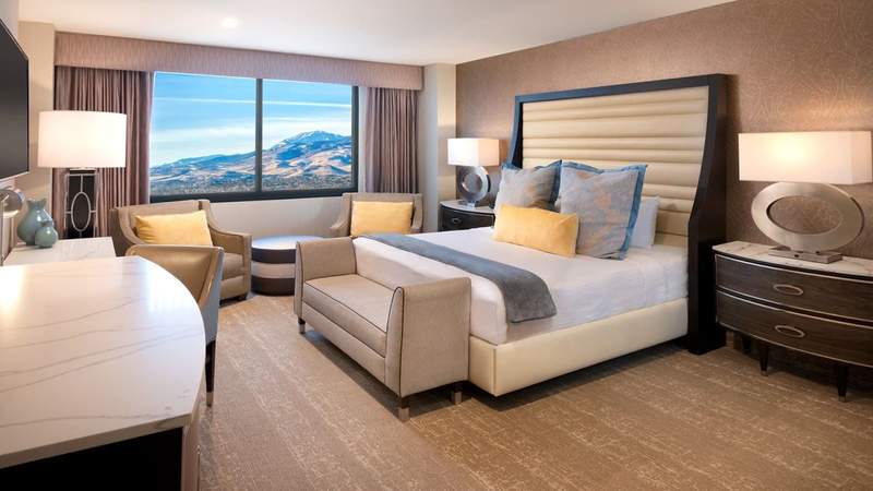 Large hotel room with king sized bed large enough for a girls' group trip to Reno.
