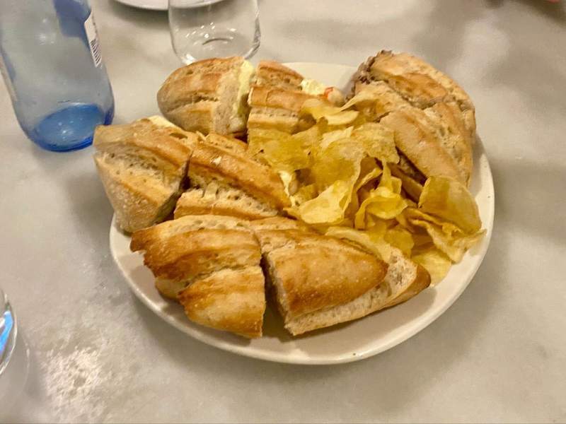 A plate of mini sandwhiches