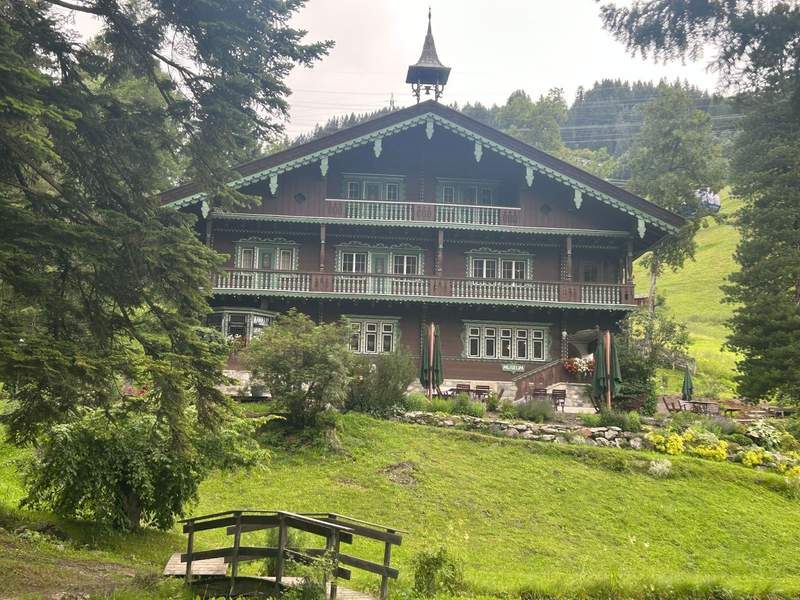 An exterior view of the beautifully restored, Villa Trier, a historic summer residence, which is now the St. Anton am Arlberg Museum.