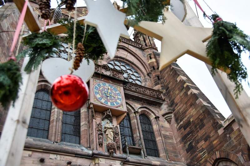 Looking through Christmas decorations at a cathedral  