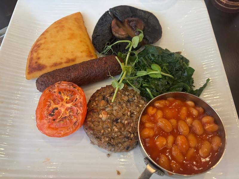 The full Scottish breakfast, with vegan haggis and sausage, beans and veggies.