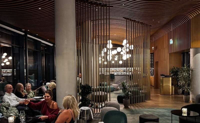 The riverside wide bar offers splendid views at sunset from The Westin London City.