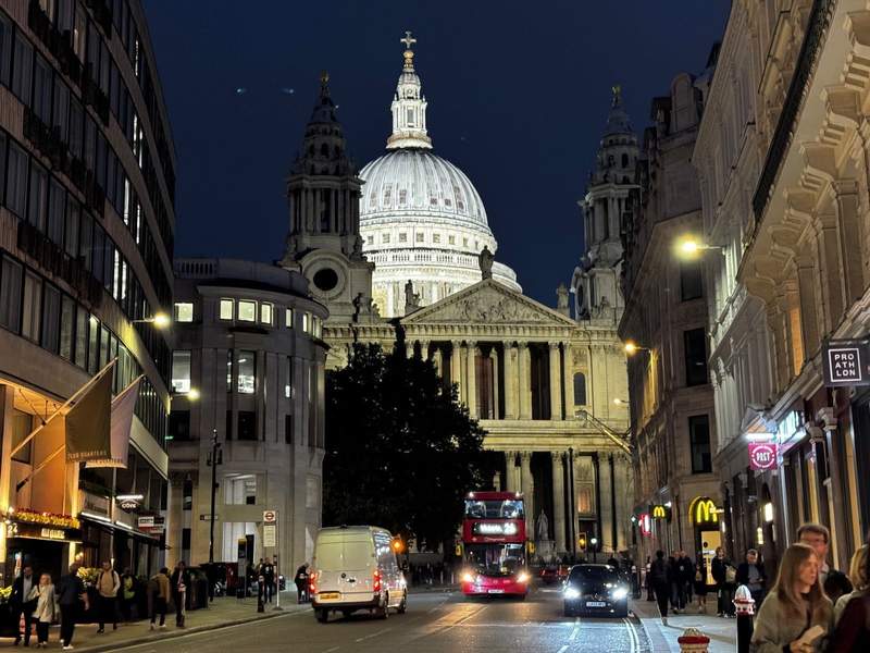 At night, the City of London is quiet making for a safe and welcome environment to view the iconic St. Paul's Cathedral lit up at night.