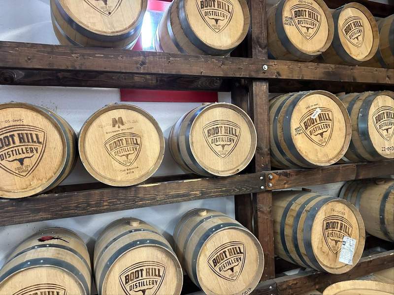 Barrels of whiskey at Boot Hill Distillery, a stop on the Kansas Gunsmoke Trail