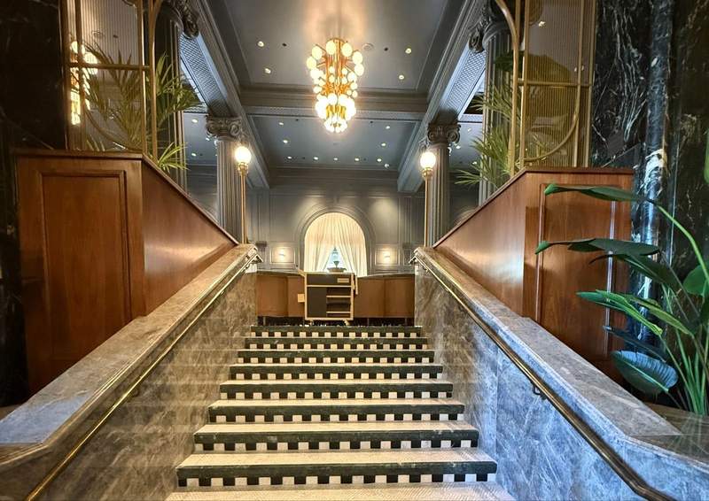 Staircase from Bourbon Steak Lounge to Bourbon Steak restaurant. 