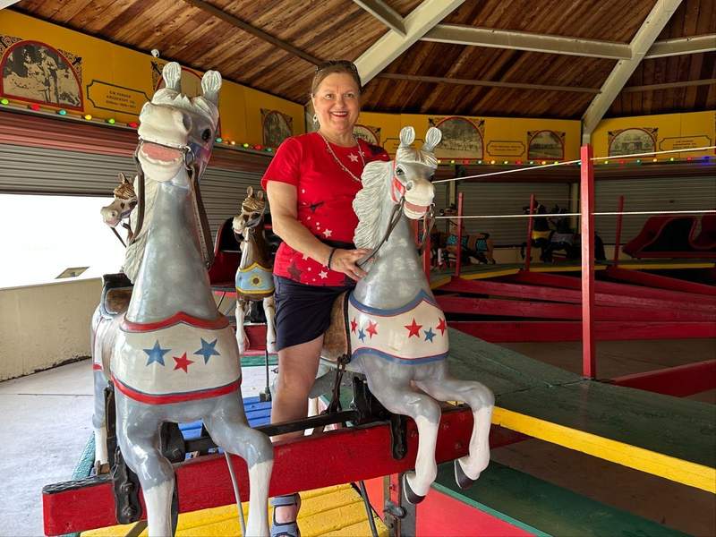 The author riding the C.W. Parker Carousel.