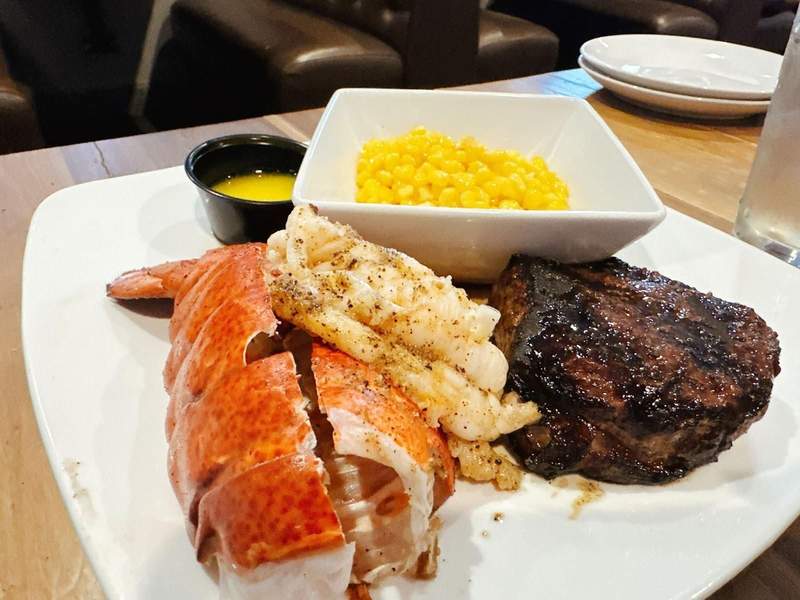 Steak, lobster and corn at Hickok's Steakhouse, a stop on the Kansas Gunsmoke Trail