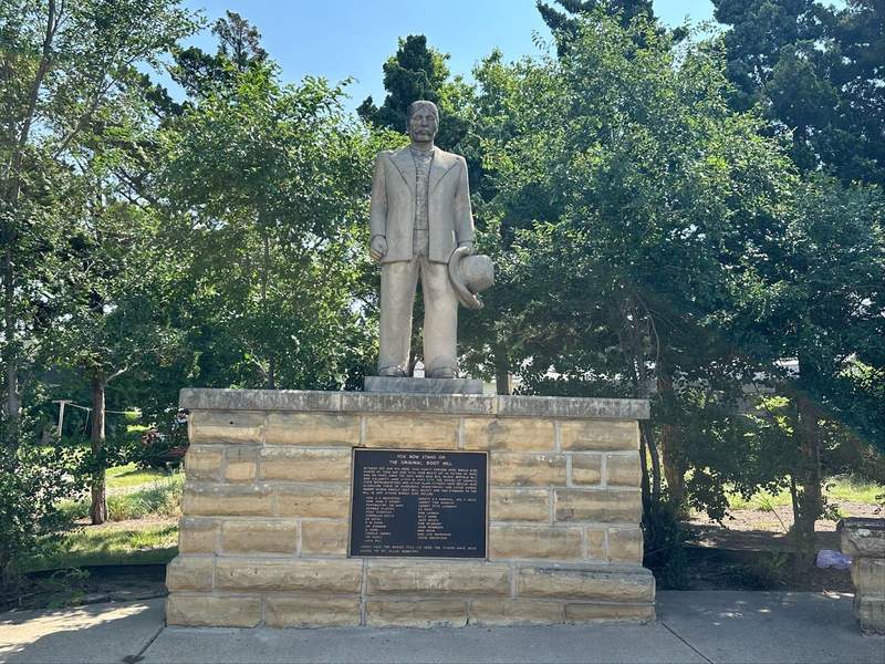 Limestone statute by Pete Felten in the Boot Hill Cemetery.
