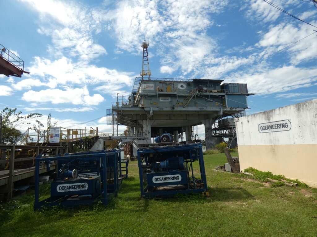 An oil rig sitting on land for visitors to explore
