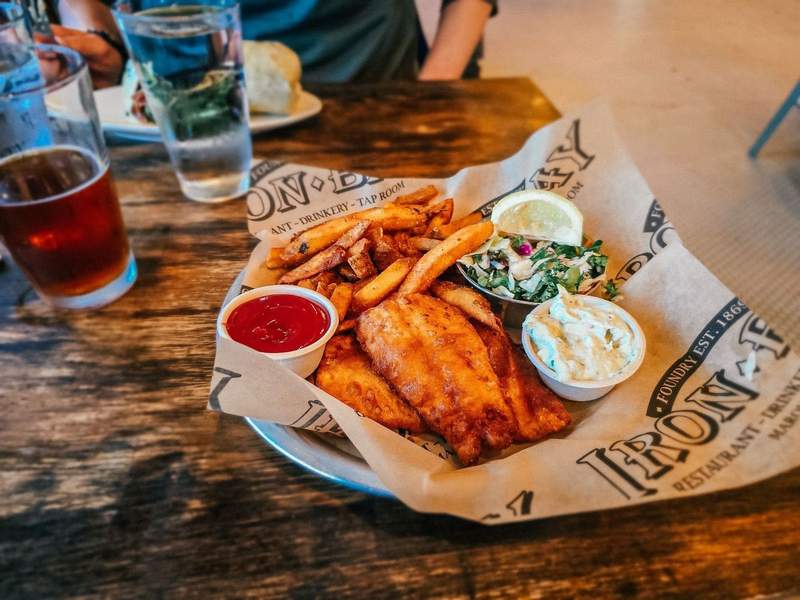 fried walleye and french fries in a basket