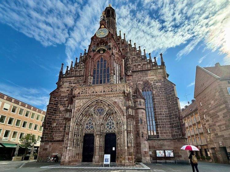 Gothic Church of Our Lady (Frauenkirche) on Nuremberg’s main square, with its ornate façade and central clock tower.