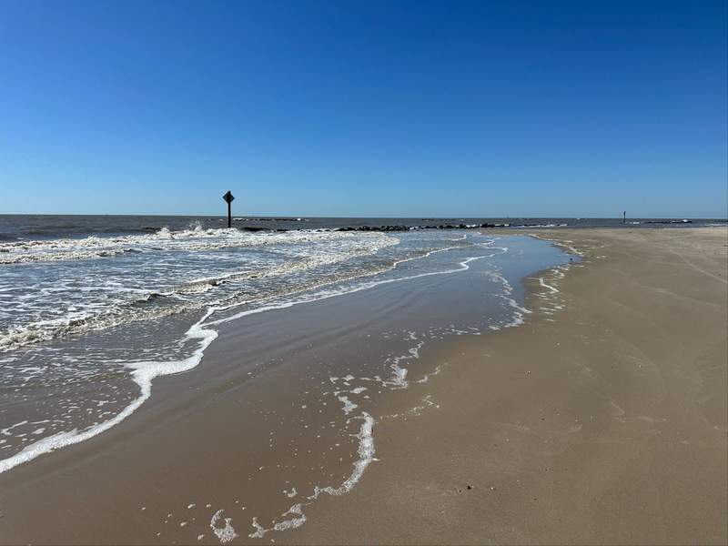 Wide open, uncrowded beach with small waves in Lake Charles, LA.  