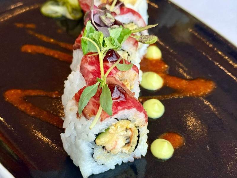 Sushi roll with sauce at California Grill, located in Disney's Contemporary Resort in Walt Disney World