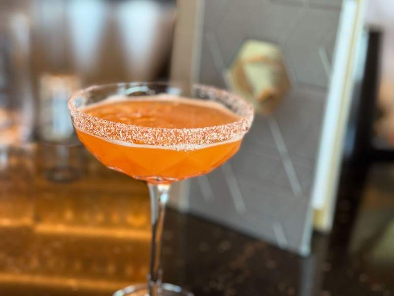 pink cocktail with sugar rim served at GEO-82, an Epcot restaurant at Walt Disney World