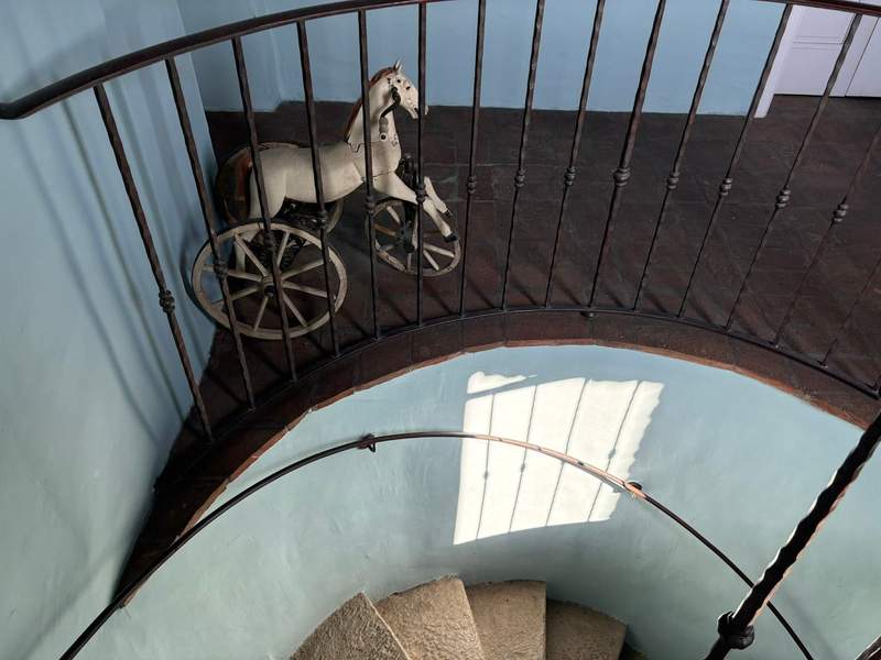 Stone staircase with antique horse figure