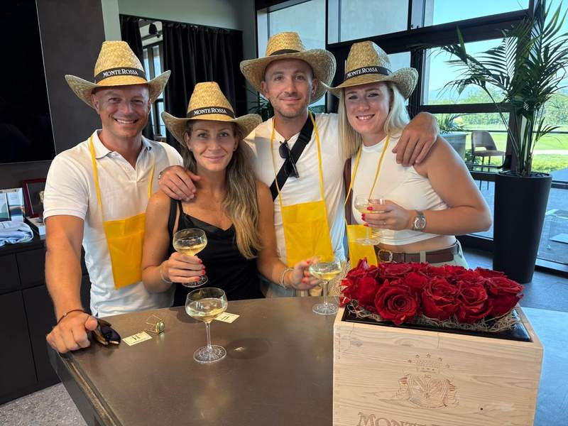 Winery visitors holding glasses