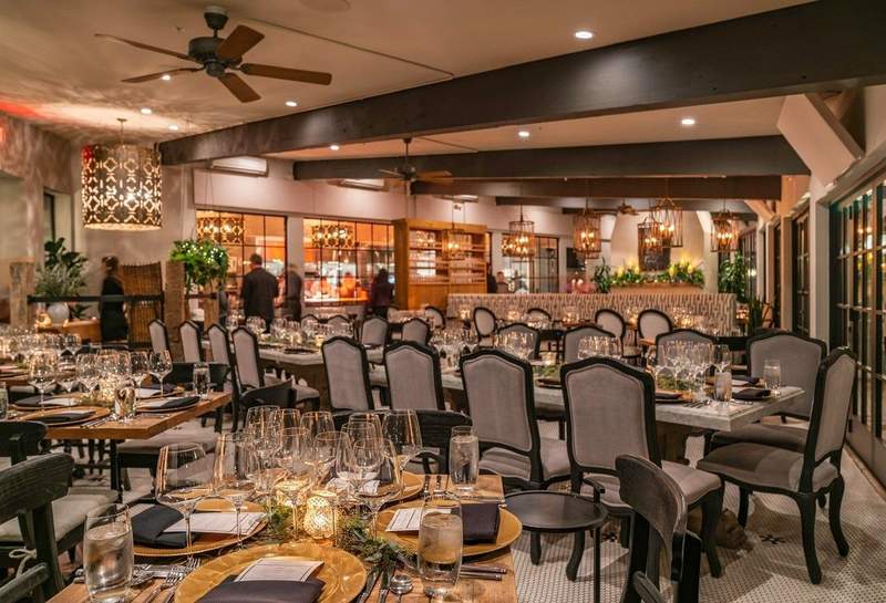 Elegantly set tables in the dining room at Leoness Cellars restaurant in Temecula.