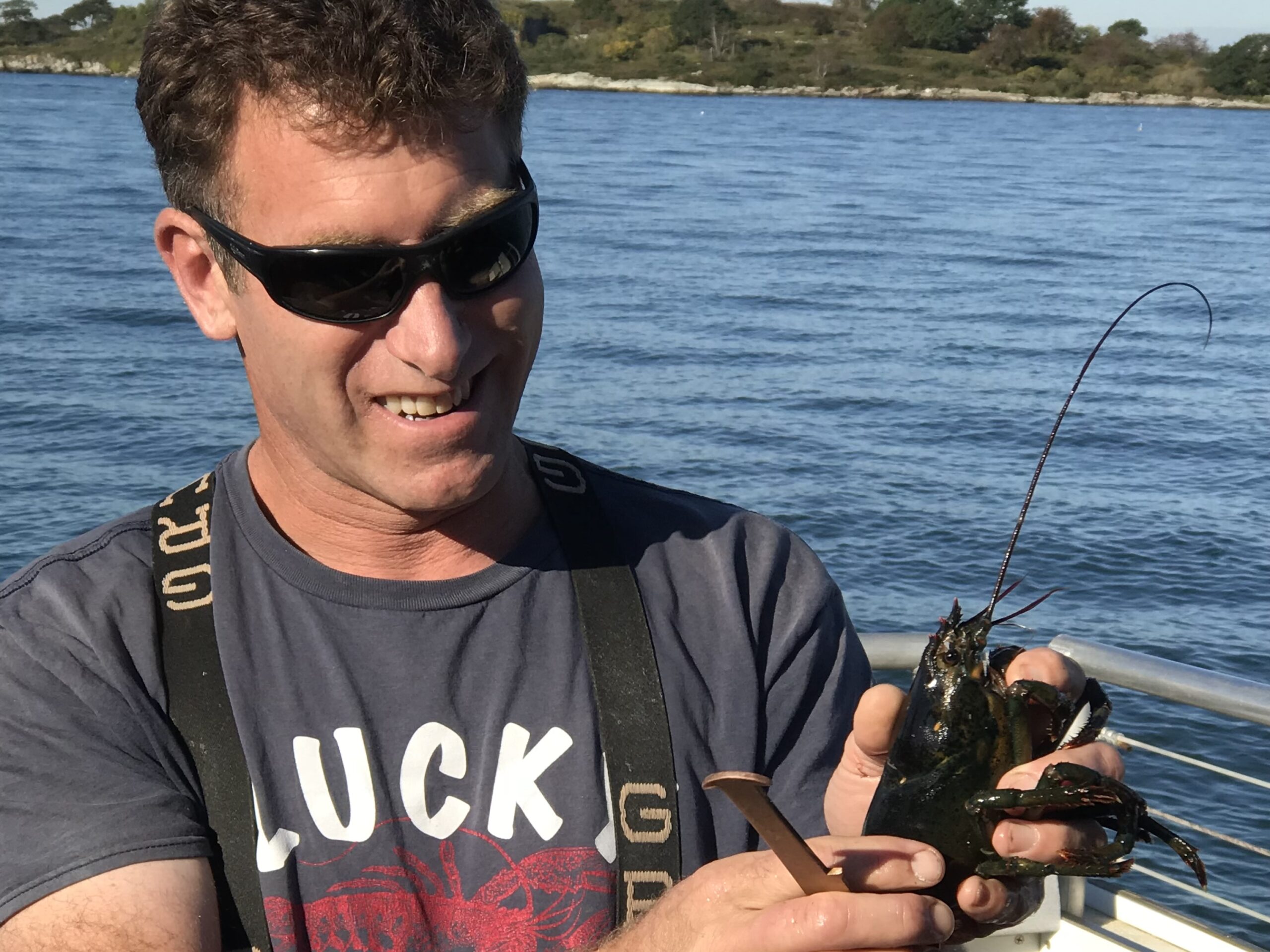 Lobster boat captain with catch in Portland, Maine.