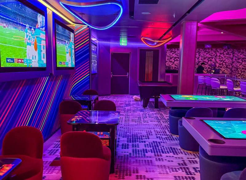 gaming room with televisions