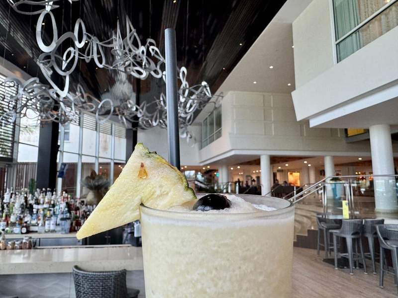 Pina Colada with ice, cherry and a pineapple slice