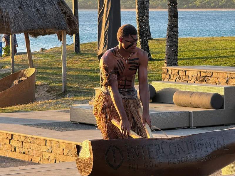 Fijian drummer welcoming guests at the InterContinental Fiji Golf Resort and Spa.