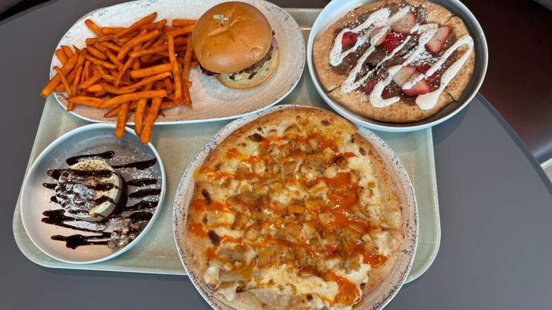 pizza chocolate dessert dessert pizza and burger with sweet potoato fries on a tray at Universal Terra Luna Resort Orlando. 